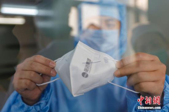 中国疾控中心专家：口罩可重复使用 挂通风阴凉处
