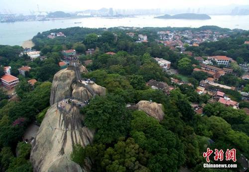 可可西里鼓浪屿双双申遗成功 “世遗”应如何保护？